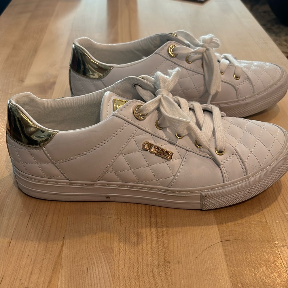 Women’s guess white and gold tennis shoes